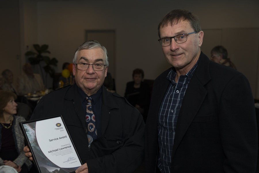 President Gerhard Velaitis presents a Service Award to Michael Lawrence. Photo: Will Godward. Supplied by ASSA.