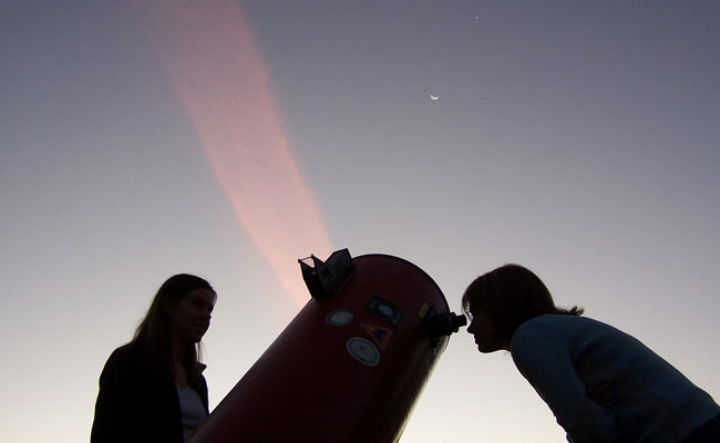 Looking through telescope